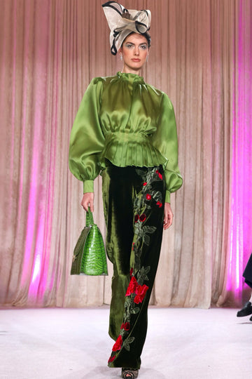 Nardos designed set with embroidered roses on one leg and a organza green blouse with bell sleeves