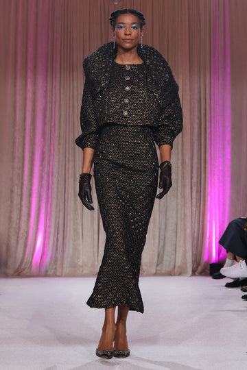 Nardos designed metallic jacquard set with jewel button closures of the jacket with a long subtle flare pencil skirt